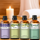 Quatre flacons d’huiles essentielles de 30 ml aux parfums lavande, vanille, jasmin et eucalyptus, sur fond spa zen avec bougie et serviette